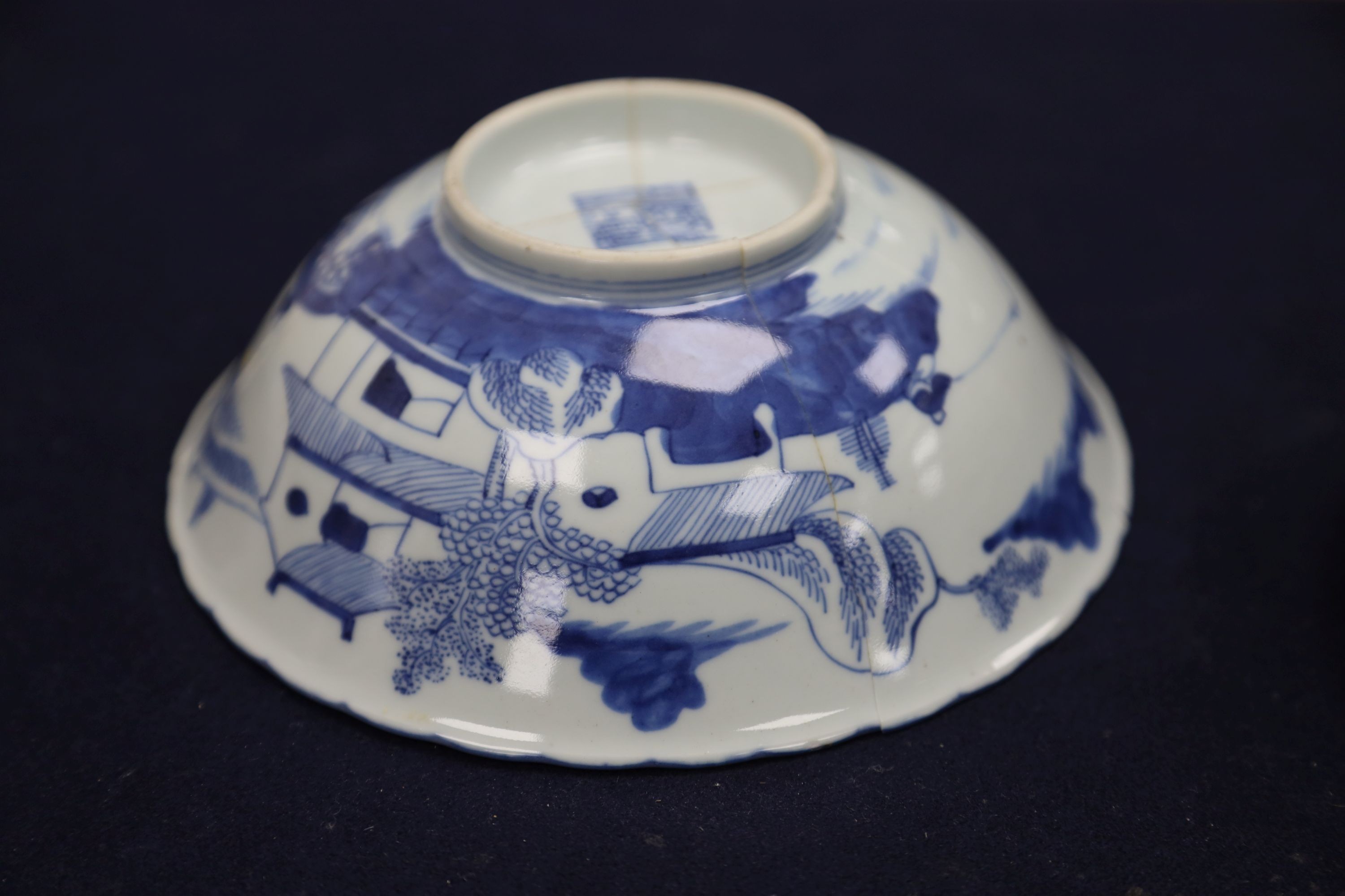 A Chinese blue and white landscape bowl, a/f and a Chinese blue and white 'dragon' dish, 18cm and 16.5cm